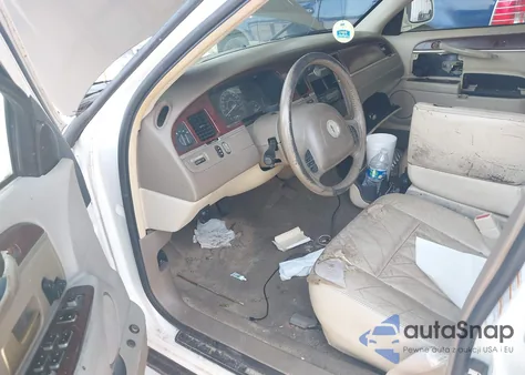 2004 Lincoln Town Car Signature z USA, uszkodzony, nr VIN 1LNHM81W24Y607979